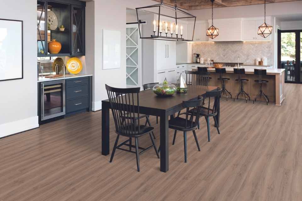 wood look luxury vinyl plank in open concept modern farmhouse kitchen dining room